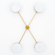 Aurora, one of the pieces in the Celeste collection, is entirely handmade. The combination of minimalist shapes, captivating geometries and excellent materials creates the strong personality of this lamp. Thanks to its 4 opaline Murano glass globes supported by 4 brass arms, it stands out in the interior environment it is placed in. Aurora can be mounted both as a hanging and a wall lamp.