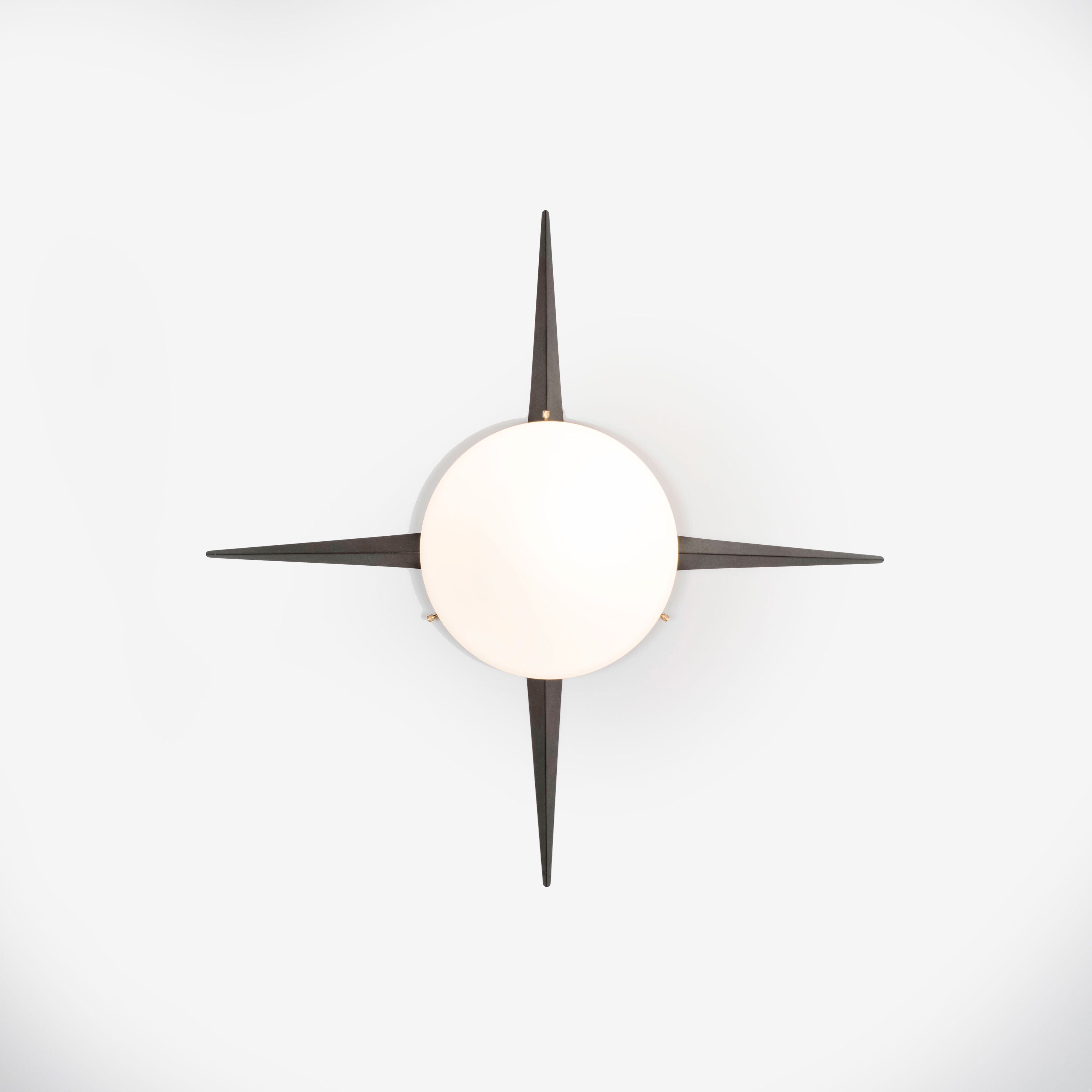 4 brass rays that radiate from an opaline Murano glass core. A tribute to the Sun, to Italian-made products and to the excellent Italian craftsmanship. Cross, like all the pieces in our collections, is handmade by our craftsmen, guided by an obsession for detail and the search for perfection.