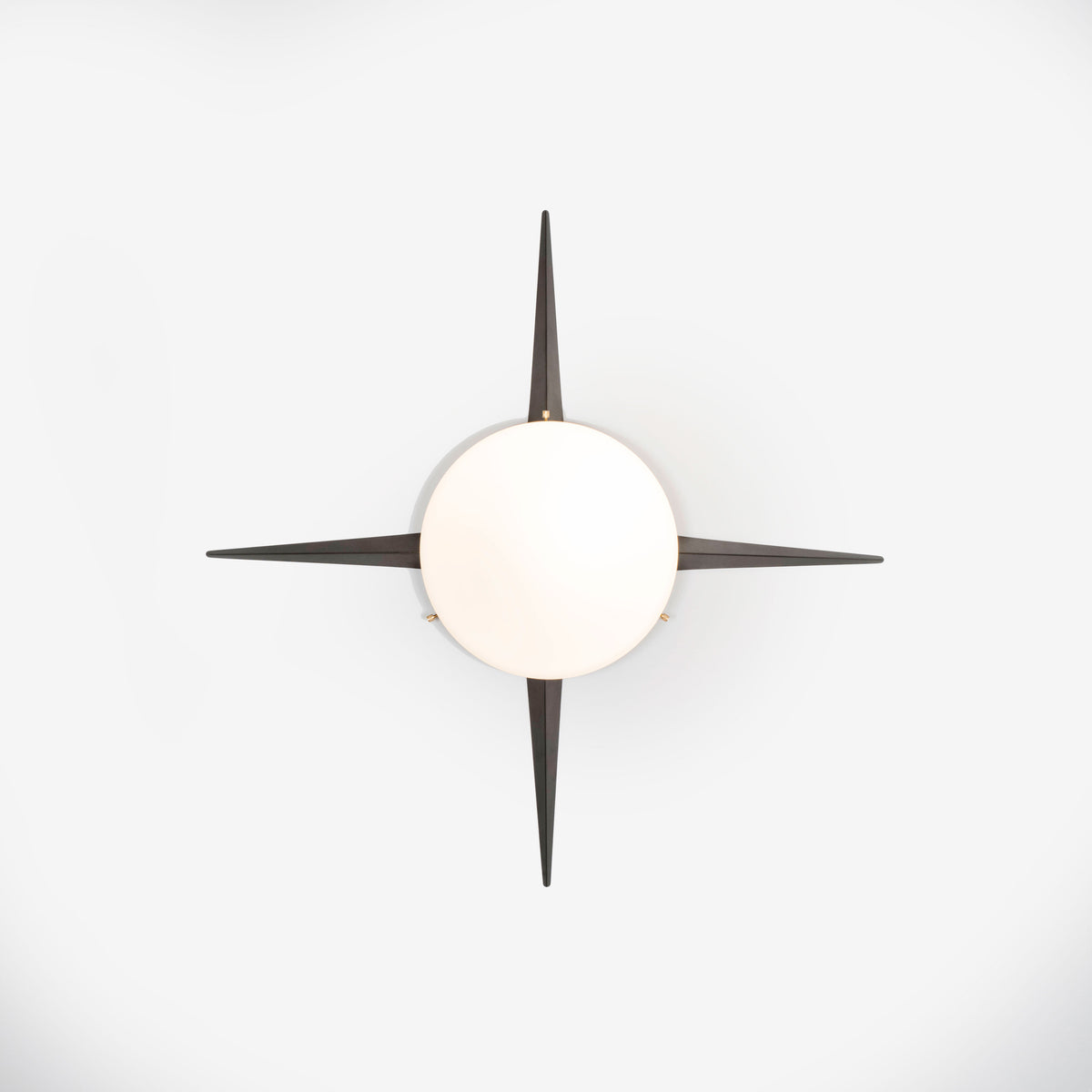 4 brass rays that radiate from an opaline Murano glass core. A tribute to the Sun, to Italian-made products and to the excellent Italian craftsmanship. Cross, like all the pieces in our collections, is handmade by our craftsmen, guided by an obsession for detail and the search for perfection.