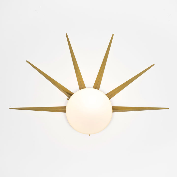 6 brass rays that radiate from an opaline Murano glass core. A tribute to the Sun, to Italian-made products and to the excellent Italian craftsmanship. Dawn, like all the pieces in our collections, is handmade by our craftsmen, guided by an obsession for detail and the search for perfection.