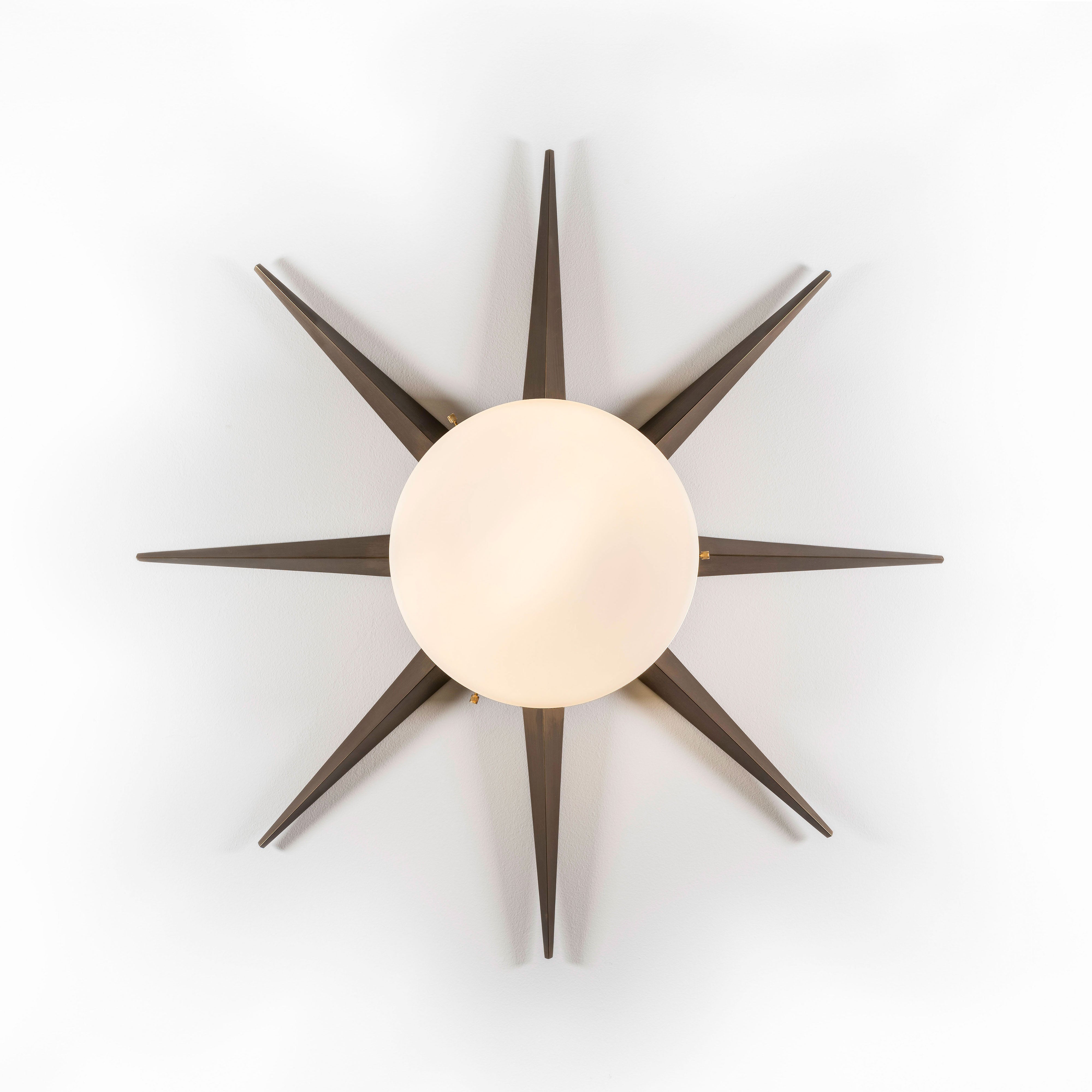 8 brass rays that radiate from an opaline Murano glass core. A tribute to the Sun, to Italian-made products and to the excellent Italian craftsmanship. Punk, like all the pieces in our collections, is handmade by our craftsmen, guided by an obsession for detail and the search for perfection.