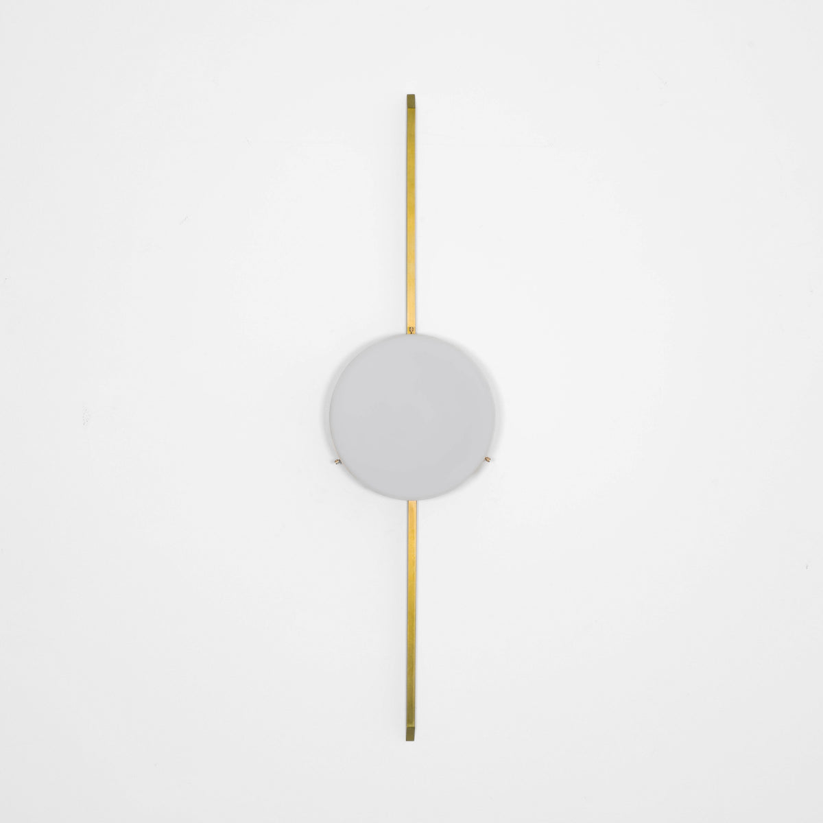 Solitude, one of the pieces in the Celeste collection, is entirely handmade. The combination of minimalist shapes, captivating geometries and excellent materials creates the strong personality of this lamp. Thanks to its opaline Murano glass globe supported by one brass arm, it stands out in the interior environment it is placed in. Solitude can be mounted both as a hanging and a wall lamp.