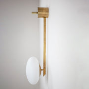  This elegant and iconic lamp in brass and opaline is inspired by mid-century Italian design. Angel is composed of an arm that supports with elegant lightness a Murano opaline glass globe. It can be mounted both as a ceiling and a wall lamp. Angelo Lelli Style