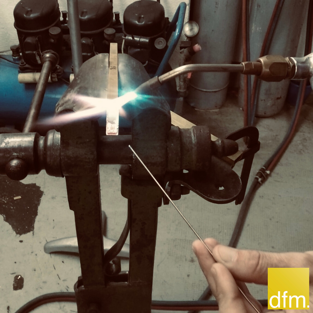 Brass being worked by hand in the Design for Macha manufacture in Milan